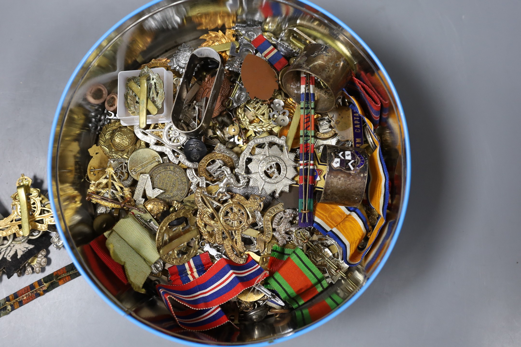 A mixed lot of military cap badges